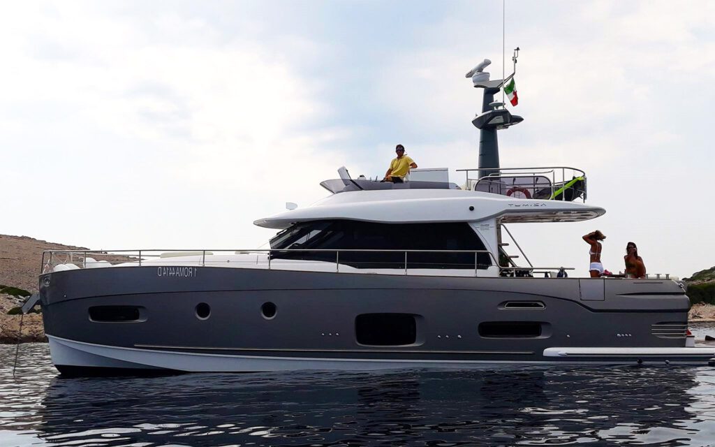 Azimut 54 luxury motor yacht anchored in Kornati National Park, Croatia—offering premium yacht charter experiences in Split, Zadar, Dubrovnik, Hvar, Kornati Islands, and Istria. Spacious decks, refined interiors, and top-tier amenities ensure an unforgettable Adriatic sailing holiday.